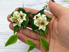 "Beautiful long white lily earrings for every lovely day. The life of real lilies is too short of making some drop and dangle flower earrings with them. Instead of real flowers, I offer you these beautiful handmade ones that will never fade. Such a piece of floral jewelry can please you for many years. They will beautifully adorn your look in any season of the year. White lilies are often chosen for both weddings and funerals. They symbolize a rejuvenation of the soul. Such lily earrings can rep Nature-inspired White Drop Earrings, White Nature-inspired Drop Earrings, Nature-inspired White Flower Jewelry, White Nature-inspired Flower Jewelry, White Dangle Flower Earrings For Birth Month, White Birth Flower Earrings, Nature-inspired, White Dangle Birth Flower Earrings, White Birth Flower Earrings In Nature-inspired Style, White Nature-inspired Earrings With Birth Flower