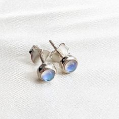 Mystic quartz stud earrings. Set in sterling silver, these are super verstile. They stand alone but also work well as a second or third lobe piercing stud to curate your look. Also available in gold vermeil. Shop our full earring collection at: https://tanviblue.etsy.com?section_id=49237495 Sterling Silver Earrings With Bezel Setting As Gift, Silver Bezel Set Earrings As Gift, Minimalist White Gold Gemstone Earrings, Minimalist Silver Earrings With Bezel Setting, Silver Bezel Setting Earrings For Gift, Minimalist Sterling Silver Earrings With Bezel Setting, Dainty Silver Moonstone Earrings, Silver Birthstone Earrings With Moonstone, Silver Minimalist Birthstone Earrings