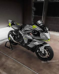 a motorcycle parked in front of a garage