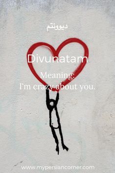 a drawing of a person holding a heart with the words divuatam meaning i'm crazy about you