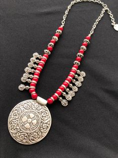 This gorgeous tribal, ottoman, bohemian style necklace is nickel and lead free. Ethnic necklace sterling silver plated with an oxidized mat finish. length is Adjustable. Made in Turkey. Shipping to the world by UPS, DHL, FEDEX After received payment, we will send within 3 working day. Please feel free to ask us if you have any questions! code: 002450 Bohemian Necklaces With Intricate Design For Festivals, Bohemian Silver Beads Necklaces For Rituals, Bohemian Necklaces With Silver Beads For Rituals, Bohemian Coin Pendant Necklace For Rituals, Bohemian Necklace With Intricate Design For Festival, Bohemian Long Necklace With Intricate Design, Bohemian Antique Silver Metal Necklace, Bohemian Red Nickel-free Necklace, Red Bohemian Nickel-free Necklace