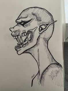 a drawing of an alien head with teeth