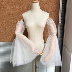 Hello, Welcome to my shop! I am a wedding veil designer, all the veils are made by myself.  I really hope you can get a dream veil in our store! These bridal sleeves are made with soft tulle. Color: Ivory (sample picture) Size: Sleeve length:In normal:21'' Biceps size:Less than 13in Personalization: Size and color can be custom-made, please contact me if you would like. Care instruction: As the fabric is fine and fragile, please do not machine wash to avoid deformation or pulling off the silk th Tulle Sleeves Diy, Detachable Tulle Sleeves, Sleeves For Wedding Dress, Unique Wedding Veils, Wedding Sleeves, Bridal Sleeves, Trumpet Sleeves, Dress Sleeves, Tulle Sleeves