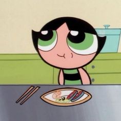 the powerpuff character is eating sushi with chopsticks in front of her