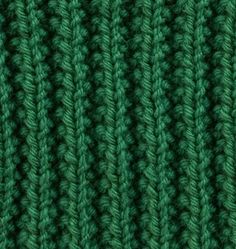 close up view of the green knitted fabric