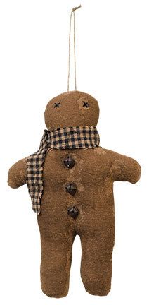 a brown teddy bear ornament hanging from a string