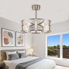 a bed room with a neatly made bed and a large window