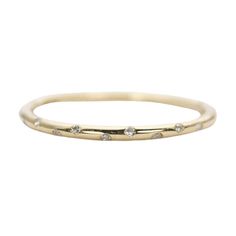 Aurora Designer - Diamond "Sprinkle" 14K Gold Wedding Band Stacking Ring Flush Set 10 Diamonds AD1147
♥  Solid 14K gold ring flush set with 10 diamonds, sprinkled evenly across the center of the ring  ♥  This is a simplistic design with half round band.  ♥  US Size 3-9  ♥  Band width: 1.3-1.5mm  ♥  Gemstone weight: 10 Heirloom Stackable Rose Gold Diamond Ring, Modern Rose Gold Stackable Diamond Ring, Modern 14k Gold Half-eternity Stackable Rings, Elegant 14k Gold-filled Rose Gold Stackable Rings, Adjustable 14k Gold Diamond-cut Stackable Rings, 14k Gold Wedding Band, Simplistic Design, 14k Gold Ring, Gold Wedding Band