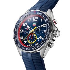 This stylish Formula 1 Red Bull men's chronograph watch from TAG Heuer features a quartz chronograph movement set in a 43mm stainless steel case. The blue dial, surrounded by a blue titanium carbide-coated stainless steel tachymeter scale fixed bezel, includes three chronograph subdials, engraved Red Bull Racing case back and hand-applied indexes with luminescent markers and hands. A scratch-resistant sapphire crystal tops the case, while the blue rubber strap is secured with fold-over clasp with safety. The men's watch is water-resistant to 200 meters. Formula 1 Red Bull, Mens Tag Heuer Watches, Tag Heuer Formula 1, Tag Heuer Formula, Tag Heuer Watch, Mens Chronograph, Chronograph Watch Men, Red Bull Racing, Mens Luxury