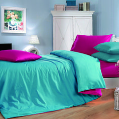 a bed with blue and pink sheets in a room