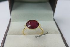 10K Yellow Gold Red Ruby Ring, Handmade Gold Ring, Lab Red Ruby Gemstone, Bezel Set Ring, Simple Ruby Ring, Gift For Her/Him, Ruby Jewelry  ★ Settings ☆ Metal - 10K Gold ☆ band Color - Yellow Gold ⍟ The ring size shown in the pictures is 7 US. ★ Main Stone ☆ Stone - Lab Red Ruby ☆ Size - 8×10 mm ☆ Shape - Oval ☆ Color Grade - AAA ☆ Weight - 5.10 Ct ★ Links : ☆ Check out my shop - https://www.etsy.com/shop/BiswasJewels?ref=seller-platform-mcnav ★ Notes : ☆ Don't forget to hit the favorite button in order to track the item on your favorites/wish list. ☆ Please leave your phone number at checkout for delivery purposes. Buyer Note :- The Buyer is Fully Responsible For Any Charges , Import, Custom Duties and Taxes in Buyer Country . Returns Policy We offer 100% Money Back Guarantee if you not s Gift Red Ruby Ring With Bezel Setting, Gift Ruby Ring With Bezel Setting, Red Ruby Ring With Bezel Setting Gift, Red Ruby Jewelry With Bezel Setting, Red Oval Rings With Bezel Setting, Red Oval Ring With Bezel Setting, Handmade Ruby Ring In Yellow Gold, Red Ruby Ring With Stone Setting, Red Ruby Ring