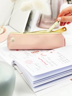 Perfect for stationery lovers, our blush pink pencil case is a must-have desk accessory for keeping your workspace tidy. Whether you're upgrading your stationery storage at the office or need a new back to school pencil case, this luxury pen pouch combines both elegance and functionality. Individually handcrafted from soft vegan leather, complete with an inner lining for durability. - Holds 10-15 pens or pencils - Slim shape - Approx. 20cm in length - Ideal new job gift for a friend - Blush Pink Pencil Case Photography, Pink Portable Organizer For Personal Use, Pink Pencil Organizer With Pen Holders, Pink Pencil Case With Zipper Pouch For Organization, Pink Organizers For Everyday Use And Back To School, Pink Zipper Pouch Pencil Case For Organization, Pink Pouch Stationery For Back To School, Pink Stationery With Pen Slots For Organization, Pink Stationery With Pen Holders For Personal Use