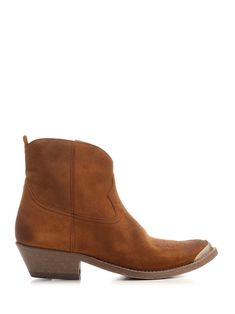 Ankle boots "Young" from Golden Goose in cognac brown suede, with western style stitching, antique brass point detail, lateral zip. Brown Snip Toe Heeled Boots With Suede Lining, Brown Heeled Boots With Suede Lining And Snip Toe, Brown Suede Heeled Boots With Snip Toe, Western Style Brown Suede Boots, Brown Goodyear Welted Desert Boots With Round Toe, Brown Suede Boots For Ranch, Brown Suede Western Boots, Brown Low-top Boots With Textured Sole, Brown Goodyear Welted Desert Ankle Boots