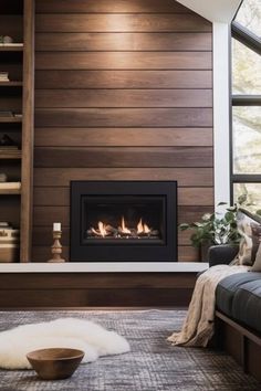 a living room with a couch and fireplace