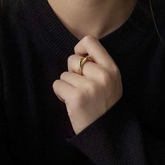 The Alexa Unity Ring is 18k gold plated on high quality stainless steel formulated for water and tarnish resistance, allowing for a timeless piece for everyday wear. Expertly crafted, the ring is a perfect expression of strength and beauty. Material: 18k gold plated on stainless steel Gold Stainless Steel Ring With Polished Finish, Everyday Gold Stainless Steel Rings, Gold Stainless Steel Minimalist Ring, Gold Minimalist Stainless Steel Ring, Minimalist Gold Stainless Steel Rings, Classic Gold Midi Rings For Promise, Rose Gold Stainless Steel Tarnish Resistant Rings, Gold Wide Band Ring Tarnish Resistant For Everyday, Gold Open Ring For Everyday