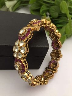 Material:  brass, Cz Stone, Kundan Polk Stunning Gold Bracelet with Royal and Elegant look. You can wear this with any kind of outfits like Kurtis, lehanga, Sarees and Trousers and Denims. Most eligible gift for someone you love and someone very special for you. Best gift for your anniversary. Best gift for her Birthday. Bracelet : 1 Arrives in a small plastic box. For any queries please contact me. Luxury Kundan Bracelets For Wedding, Traditional Jeweled Bracelets For Ceremonial Occasions, Kundan Bracelets For Festive Occasions, Temple Jewelry Meenakari Bracelets For Celebration, Temple Jewelry Style Meenakari Bracelets For Celebration, Traditional Jeweled Bracelets For Celebration, Festive Kundan Jeweled Bracelets, Kundan Temple Jewelry Bracelets For Celebration, Temple Jewelry Style Kundan Bracelets For Celebration