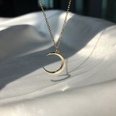 $14.99 USD This Moon Silver Necklace has a unique and dainty moon shaped pendant. Its lines are very beautiful and smooth. Not allergic, not fade, packed in a beautiful box, ready for gifting! Detail: Material: S925 Sterling Silver + Platinum Plating Chain Size: 40cm + 5cm ( 15.7 inch + 2 inch ) Pendant Size: 1.5cm Dainty Moon Necklace, Crescent Moon Necklace Silver, Crescent Moon Necklace Gold, Black Chain Necklace, Moon Necklace Silver, Gold Moon Necklace, Moon Pendant Necklace, Crescent Moon Necklace, Gold Moon