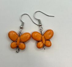 Handmade Handmade Orange Dangle Jewelry, Casual Orange Earrings, Cutie Orange Earrings, Handmade Heart-shaped Orange Jewelry, Playful Orange Dangle Jewelry, Orange Butterfly-shaped Jewelry Gift, Orange Butterfly, Butterfly Earrings, May 22