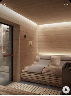 a spa room with a bed and shower