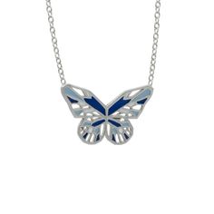 A blue butterfly is perceived as a wish-granter, if you spot one consider yourself very lucky! The Blue Morpho is the most well-known blue specimen. It has iridescent vivid blue wings with black edges and they can be as wide as 8 inches, placing the Blue Morpho among the largest butterfly in the world. This blue butterfly necklace is more on the dainty side though: it is a bit under 1 inch wide and half an inch high. It makes for a perfect everyday necklace that can be layered with other longer chains or a choker. I hand enamel it with in different shades of blue: pastel blue, cobalt and and turquoise/teal. I designed the wings in a geometric way and you would be surprised to know that geometry is omnipresent in the real lepidopter too. Indeed, pigmentation is not the cause of the shiny ir Monarch Butterfly Necklace, Blue Butterfly Necklace, Butterfly Necklace Silver, Blue Morpho Butterfly, Blue Morpho, Blue Wings, Largest Butterfly, Enamel Necklaces, Ethical Jewelry