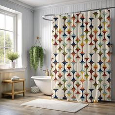 a bathroom with a bathtub, rug and shower curtain that has circles on it