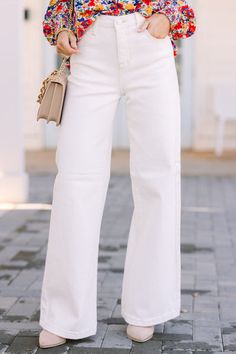 These crisp white, wide leg jeans are so chic and trendy! Not only that, they are perfect for the spring! You are going to love styling these jeans with flowy blouses or even with basic tops.  Button/zip front closure Pockets Wide legs Fair... Trendy White High-rise Flare Jeans, White Cotton Wide Leg Pants For Day Out, Elegant White High Rise Flare Jeans, Elegant White Flare Jeans For Spring, Chic High Rise Wide Leg Pants With Button Closure, High Rise Wide Leg Pants For Spring Day Out, High-rise Wide Leg Pants For Spring Day Out, Spring High Rise Wide Leg Pants For Day Out, Chic Cotton Flare Jeans For Day Out