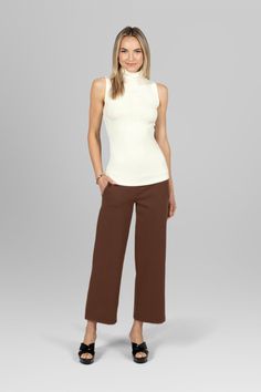 Full outfit featuring the Traveler Ankle Pant in dark khaki paired with a white top, showcasing a chic and versatile look perfect for casual outings Check Mark, Effortlessly Chic Outfits, Travel Pants, Sleeveless Turtleneck, Dark Khaki, Tres Chic, Ankle Length Pants, Ankle Pants, Tight Leggings