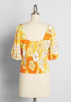 Seaside Cottage Getaway Tie-Front Top in Honolulu Floral | ModCloth Retro Printed Blouse For Beach, Retro Printed Blouse For The Beach, Printed Tops For Vacation Day Out, Vacation Rayon Blouse With Floral Print, Floral Print Rayon Blouse For Vacation, Bohemian Tops For Beach Vacation, Floral Print Tops For Vacation Day Out, Orange Tropical Tops For Beach Season, Tropical Orange Tops For Beach Season