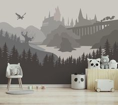 a child's room with a castle wall mural and wooden toys on the floor