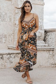 Black Retro Boho Floral Tassel Tie Maxi Dress Black Bohemian Dress With Boho Print, Black Boho Print Dress For Festival, Black Boho Print Maxi Length Dress, Black Boho Dress With Print For Vacation, Black Boho Print Maxi Dress For Vacation, Casual Black Dress With Boho Print, Casual Black Dresses With Boho Print, Black Bohemian Midi Dress For Summer, Casual Black Dress With Tassels