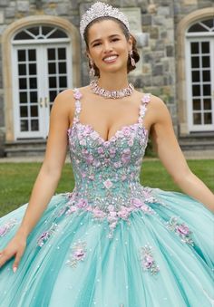 Be photo ready in breathtaking style 60176 by Vizcaya. The fitted corset bodice has a sweetheart neckline and is adorned in eye catching applique and beaded details that make an appearance on the voluminous glittering tulle skirt. Quinceanera Dresses Damas, Glitter Tulle Dress, Fitted Corset, Damas Dresses, Sage Garden, Dresses Quinceanera, Baptism Dress, Corset Bodice, Prom Dress Shopping