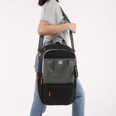 A Sherpani best-seller, our newly updated Camden backpack now has even more to love! This backpack is made for all-day adventures with a large capacity to handle those “just in case” items. Made from recycled material, the Camden features three water bottle holders, a padded laptop sleeve and a luggage pass through. The perfect personal item for air travel, the Camden is sure to be your new travel favorite! Mini Laptop, Packing Luggage, Backpack Free, Convertible Backpack, Convertible Bags, Water Bottle Holders, Air Travel, Classic Backpack, Satchel Purse