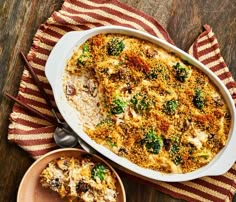 a casserole dish with broccoli and mushrooms in it next to a bowl of rice