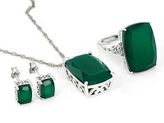 20x14mm and 8x6mm rectangular cushion green onyx rhodium over sterling silver ring, earrings and necklace boxed set. Pendant measures approximately 1 1/8"L X 9/16"W with 18" singapore chain. 3mm bail and lobster claw clasp with a 2" extender. Stud earrings measure approximately 5/16"L X 3/16"W with tension post backings. Solitaire ring measures approximately 3/4"L X 1/16"W. Not sizeable. Elegant Green Jewelry With Polished Finish, Green Gemstone Jewelry For Formal Occasions, Cushion Cut Sterling Silver Earrings, Fine Jewelry With Polished Rectangular Stone, Fine Jewelry With Polished Finish And Rectangular Shape, Formal Sterling Silver Jewelry With Rectangular Stone, Silver Jewelry With Polished Emerald Cut, Formal Sterling Silver Jewelry Sets With Oval Shape, Classic Green Jewelry With Polished Finish