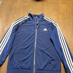 Brand New Navy Blue Adidas Track Jacket Size Medium Casual Blue Adidas Outerwear, Casual Blue Track Jacket For Winter, Casual Blue Winter Track Jacket, Blue Adidas Track Jacket For Winter, Blue Adidas Track Jacket For Spring, Adidas Blue Track Jacket For Spring, Adidas Blue Track Jacket For Winter, Blue Spring Sports Outerwear, Adidas Navy Casual Track Jacket