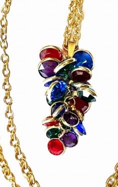 Vintage Bezzle colored Gold hanging Necklace. This is multicolored and will match everything. In great preowned condition Colorful Costume Jewelry Necklaces For Party, Elegant Multicolor Jeweled Crystal Necklaces, Elegant Multicolor Crystal Necklaces For Party, Multicolor Jeweled Crystal Necklace Gift, Multicolor Crystal Jewels Necklace As Gift, Multicolor Crystal Necklace With Jewels For Gift, Multicolor Crystal Necklace With Jewels As Gift, Multicolor Jeweled Pendant Necklace, Multicolor Crystal Necklaces For Parties