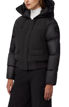 A reliable combination of partially recycled Organic Arctic Tech® with featherlight ripstop creates a modern silhouette with superior protection from the cold. An adjustable hood with a roomy fit, 625-fill-power down insulation and multiple pockets for storage enhance the must-have quality of this all-season jacket. 22" length (size X-Small)   Two-way front-zip closure with storm flap   Stand collar; down-filled drawcord-toggle hood with removable brim   Ribbed cuffs and hem   Chest welt hand-wa Canada Goose Women, Luxury Outerwear, Jacket Women, Black Label, Canada Goose, Stand Collar, Down Jacket, Fashion Boutique, Cold Weather