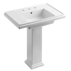 a white pedestal sink on a white background