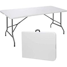 a white table with a suitcase underneath it