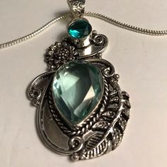 Stunning 925 Sterling Silver Aquamarine Aqua Apatite Necklace. 20 Inches N Chain Length. 2.5 Inches N Pendant Length. 30 Carats Of Aquamarine Stones. 2 Carats Of Aqua Apatite Stones. 100% Authentic Stones, 925 Sterling Silver. This Will Be A Nice Addition To Your Jewelry Collection. Thanks For Dropping In An Checking My Closet Out. God Has Blessed Me With Such Wonderful People In My Life. I’m So Appreciate Everyone Of You. “Hugs” May Gods Light Shine Upon All Of You. Spiritual Silver Jewelry With Blue Topaz, Silver Jewelry With Gemstone Accents For May Birthstone, Silver Green Amethyst Gemstones For Gift, Handmade Silver Jewelry With Green Amethyst, Silver Jewelry With Green Amethyst For Gift, Ruby Diamond Necklace, Apatite Necklace, Aquamarine Necklace, Halo Pendant