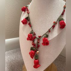 This Beautiful Handmade Jewelry Is Made Of Fine Threads And Crystal Gemstones. The Tulip Lariat Necklace Is 100% Handmade. It's A Unique Gift. Size: Approx. 21'' (This Necklace Is Flexible And Comfortable To Wear.) Color: Green Cord And Red Tulips And Gemstones (As Picture) - Due To The Light And Screen Setting Difference, The Item's Color May Be Slightly Different From The Pictures. Please Allow Slight Color And Difference. - Metal-Free. There Are 2 Different Color Choices For This Necklace. Ca Red Beaded Dangle Necklace, Handmade Red Flower Necklace With Adjustable Fit, Handmade Red Flower Necklace Adjustable, Handmade Adjustable Red Flower Necklace, Adjustable Red Flower Necklace, Red Adjustable Flower Necklace, Red Adjustable Lariat Necklace, Adjustable Red Flower Beaded Necklace, Adjustable Red Flower Beaded Necklaces