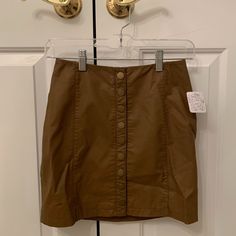 Brand New Free People Vegan Leather Mini Skirt. Light Brown With Button Closure In Front. Size 2. Never Worn, Tags Attached. Chic Brown Button-up Bottoms, Brown Mini Skirt With Button Closure For Work, Trendy Brown Mini Skirt With Buttons, Casual Beige Mini Skirt With Button Closure, Chic Brown Skirt With Button Closure, Brown Skirt With Button Closure For Summer, Brown Button Closure Skirt For Summer, Brown Mini Skirt With Button Closure, Brown Mini Skirt With Button Closure For Fall