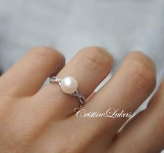 Classic Infinity Ring with Cubic Zirconia Stones & Pearl - Freshwater White Pearl With Sterling Silv Elegant Hypoallergenic Pearl Promise Ring, Elegant White Hypoallergenic Pearl Ring, Elegant Round Hypoallergenic Pearl Ring, Elegant Hypoallergenic Round Pearl Ring, Elegant Hypoallergenic Pearl Ring, Ring Design For Women, Pearl Ring Design, Natural Pearl Ring, Pinky Finger