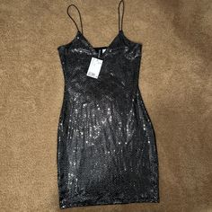 H&M Bodycon Sparkly Dress Nwt Silver Sequin Mini Dress For Club, Silver Mini Sequin Dress For Club, Silver Mini Length Sequin Dress For Club, Silver Sequined Mini Bodycon Dress, Silver Sequined Mini Length Bodycon Dress, Silver Sequined Sleeveless Bodycon Dress, Fitted Shiny Black Dress, Fitted Black Shiny Dress, Black Shiny Dress For Night Out