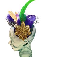 Mardi Gras Headpiece with purple, green, and gold assorted feathers. Main attraction to this piece is the beautiful gold sequin embellishment that lays in the center. A few added faux pearls and flower pearl accent attached. Perfect for Mardi Gras balls, parties, luncheons, brunches and of course anywhere in the French Quarter in New Orleans! This is all designed on a 4.33" round white fascinator base. Luxury Headpieces For Mardi Gras Carnival, Bohemian Mardi Gras Party Headpiece, Mardi Gras Headband, Adjustable Mardi Gras Festival Headband, Fantasy Headpieces For Mardi Gras, Adjustable, White Fascinator, Feather Headpiece, Wedding Hair Accessories, Mardi Gras