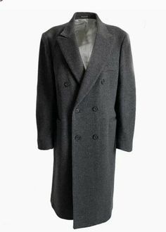 ADOLFO Vintage Cashmere Wool Double Breasted Charcoal Trench Overcoat. - The Adolfo, Made in England, Cashmere/Wool Blend, Double Breasted Top Coat, makes a terrific addition to your collection. Single Back vent, Outside Welt Chest Pocket, Outside Straight Flap pockets on the left and right side. Size: Men's 40-42 Made in England Color: Charcoal Length: below Knee Measurements: Chest - from underarm seam to underarm seam - 22" Shoulder - From Shoulder seam to shoulder seam - 19" Length - Top sea Gray Double-breasted Formal Outerwear, Formal Gray Double-breasted Outerwear, Vintage Gray Outerwear With Buttons, Vintage Gray Wool Outerwear, Classic Long Fitted Pea Coat, Formal Gray Pea Coat For Fall, Formal Gray Long Sleeve Pea Coat, Gray Single Breasted Vintage Outerwear, Vintage Gray Single-breasted Outerwear