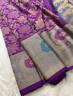 1.this is beautiful exclusive gadwal brocade pure silk sari with contrast meenakari border and pallu with running blouse piece 2.this sari is 5.5 mt length  3.this is a very elegant looking sari for all occasions like weddings and other formal events  4.this is a very traditional sari of india  5.fall n pico is complimentary  6.blouse can be made as per the requirements of the clients with proper measurements.stiching charges will be extra  7.plz check the availability of the sari before placing Purple Jamawar Saree With Self Design, Brocade Saree With Zari Weaving, Purple Jamawar Saree With Cutdana, Designer Jamawar Handloom Saree, Purple Jamawar Saree For Transitional Season, Transitional Purple Jamawar Saree, Transitional Season Purple Jamawar Saree, Designer Handloom Brocade Saree, Designer Brocade Handloom Saree