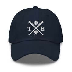 Embroidered Tampa Bay Baseball Hat: A stylish, low-profile hat that was created for the dedicated Tampa Bay baseball fan, this classic retro Ray hat is sure to be a winner with loyal followers of Ray baseball and anyone who is from Tampa Bay, FL. Features a blue, old school vintage Tampa Bay baseball team design with crossed baseball bats. A unique and nostalgic option for the Tampa baseball fan and an awesome gift for a holiday, birthday or Rays game. Retro Ray Baseball Hat Details: • 100% chin Rays Baseball, Boston Baseball, Texas Baseball, Ny Baseball, Chicago Baseball, Cleveland Baseball, Indians Baseball, Twins Baseball, Orioles Baseball