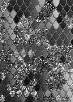 black and white photograph of scales of fish scale