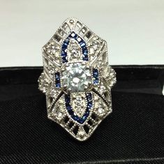 an antique diamond and blue sapphire ring